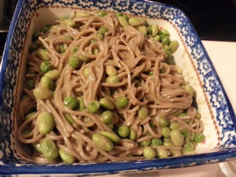 Soba noodles with peas and edamame in peanut sauce