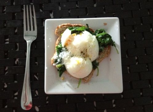 Breakfast egg with spinach and cheese