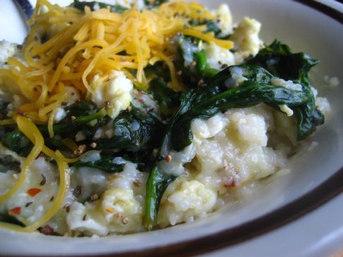Grits with eggs and spinach