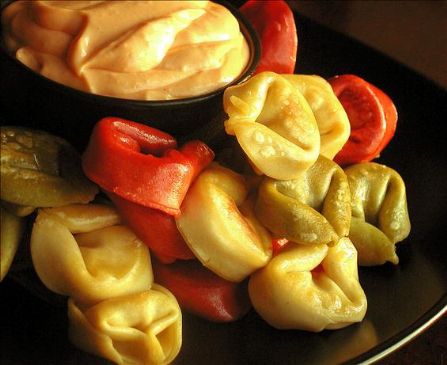 Tortellini with roasted garlic sauce