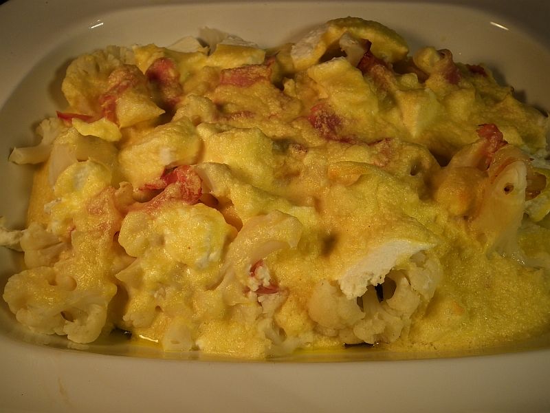 Oven cauliflower with ricotta cheese prosciutto and cream (pastella)