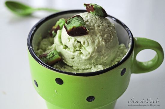 Healthy matcha ice-cream garnished with pistachio chocolate