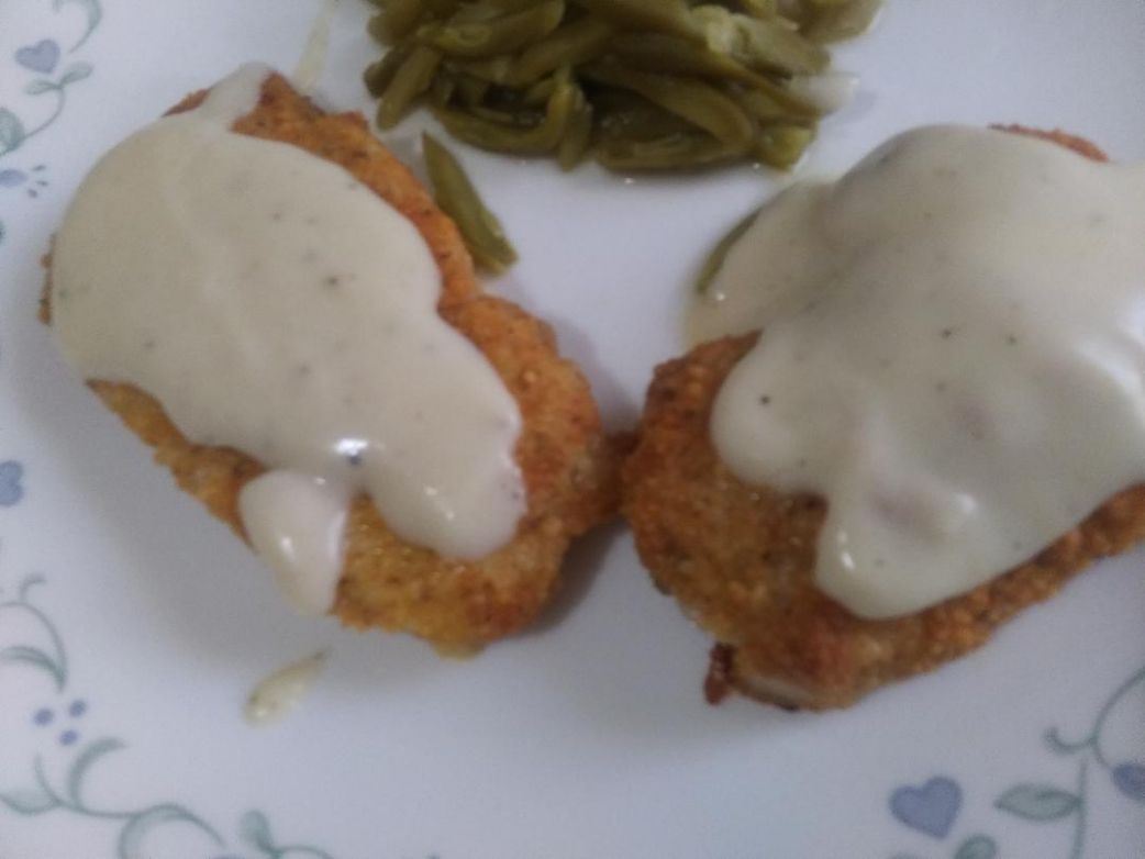 Cajun parmesan crusted Pork cutlets with white gravy