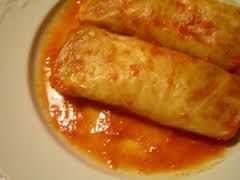 stuffed cabbage leaves in tomato sauce by Tetiana Anokhina