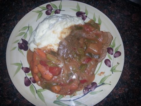 Slowcooker Swiss steak and veggies with sauce