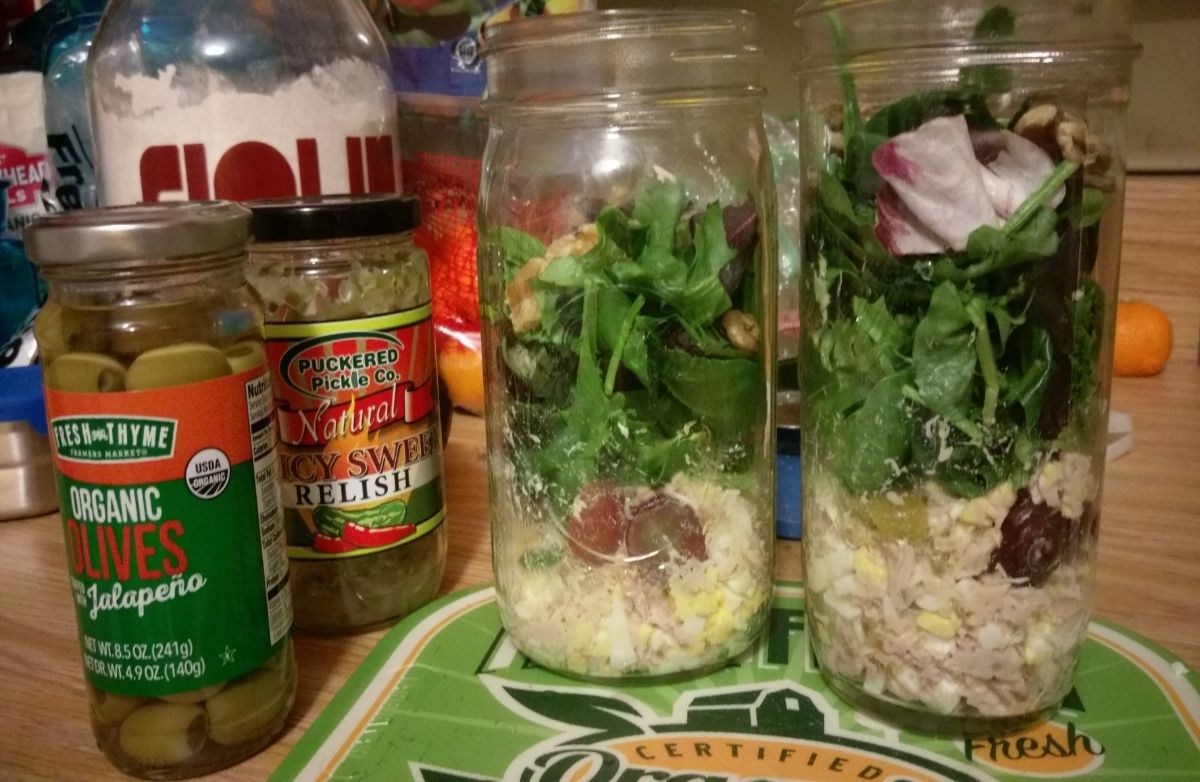 Mixed greens with tuna salad, grapes and walnuts