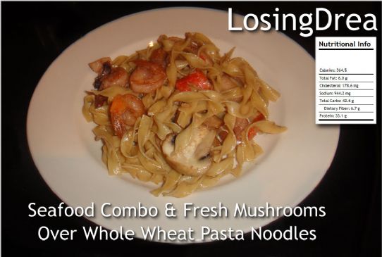Seafood Combo With Mushrooms Sauteed over Whole Grain Pasta