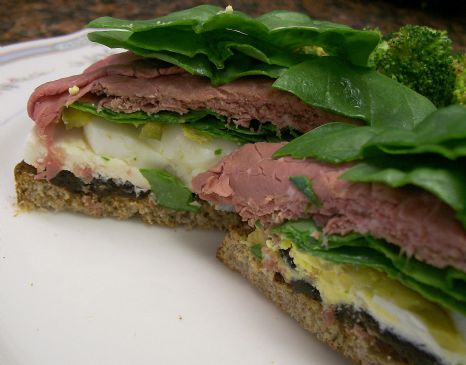 Roast Beef Whole grain Open Sandwich with Spinach, Egg, Fresh Mozzarella and Prunes