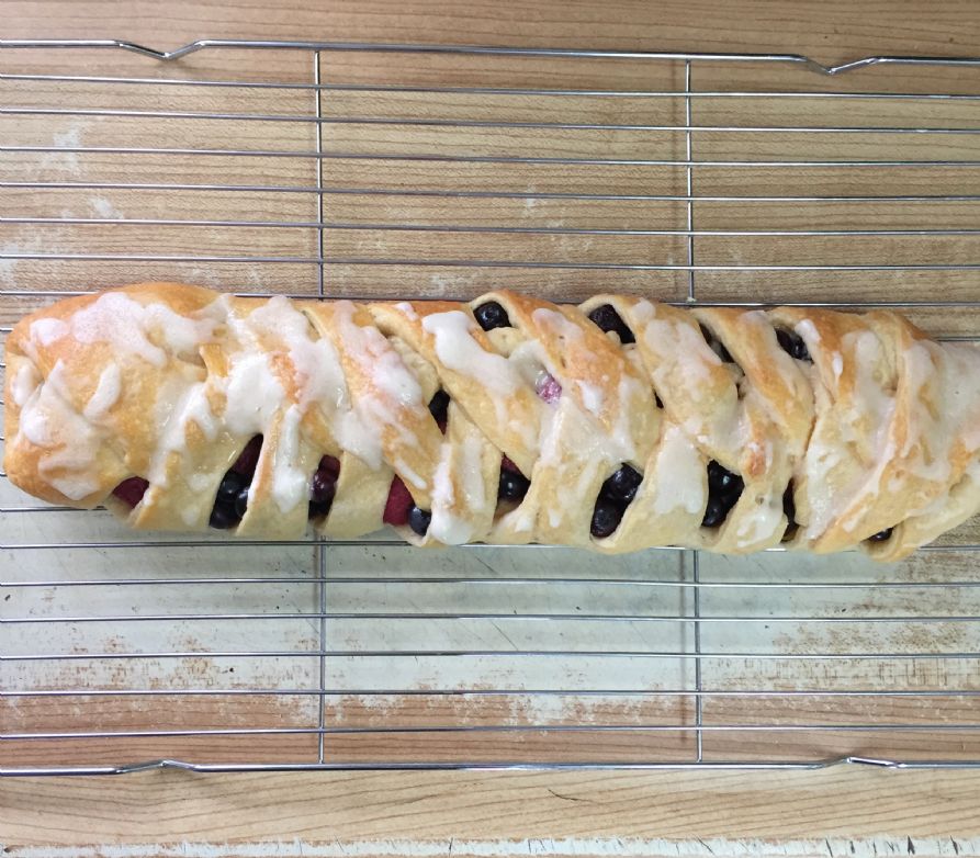 Crescent roll slice w berries and glaze