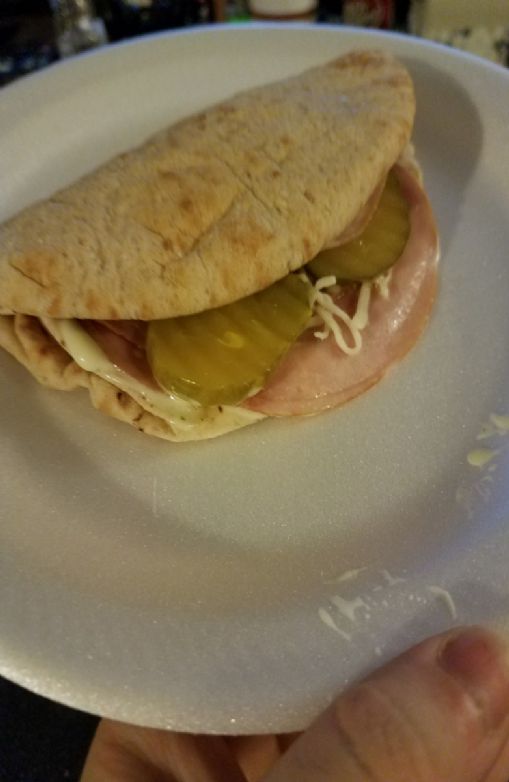 Ham and cheese with basil aioli on pita bread