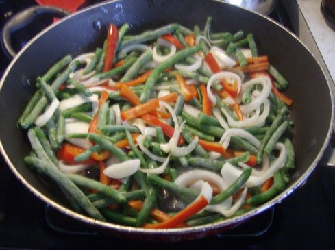 Sauteed green beans, red peppers and onions
