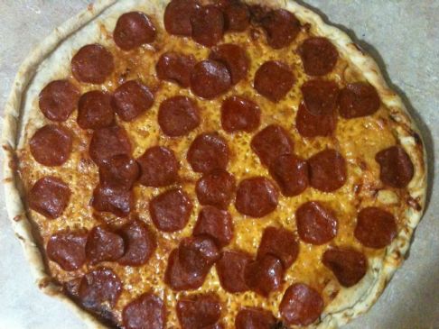 Thin Crust Turkey Pepperoni and Olive Pizza